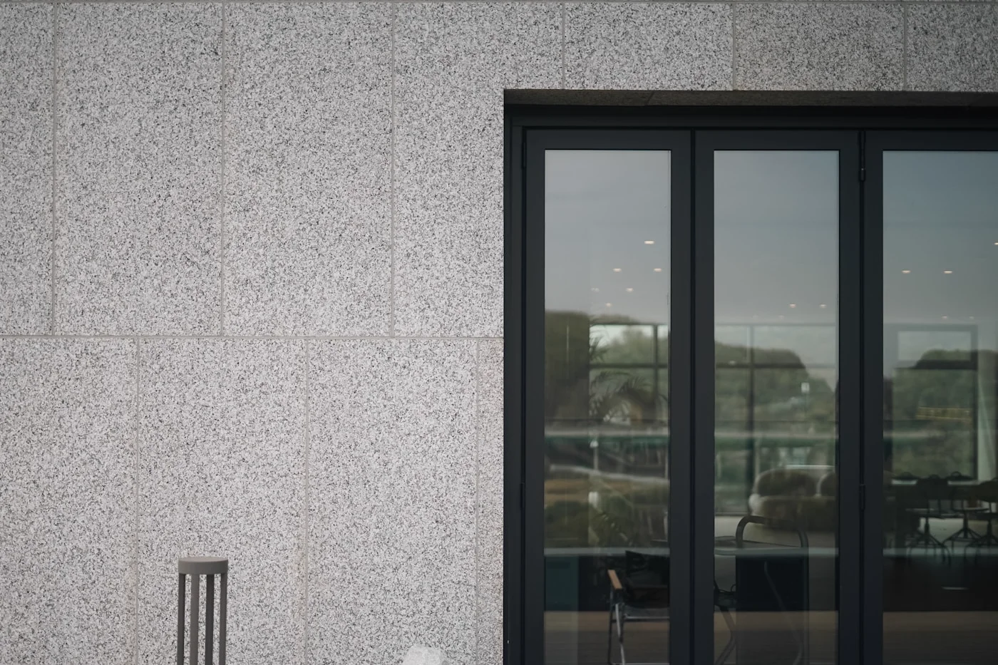 Anthracite grey aluminium sliding doors on modern home