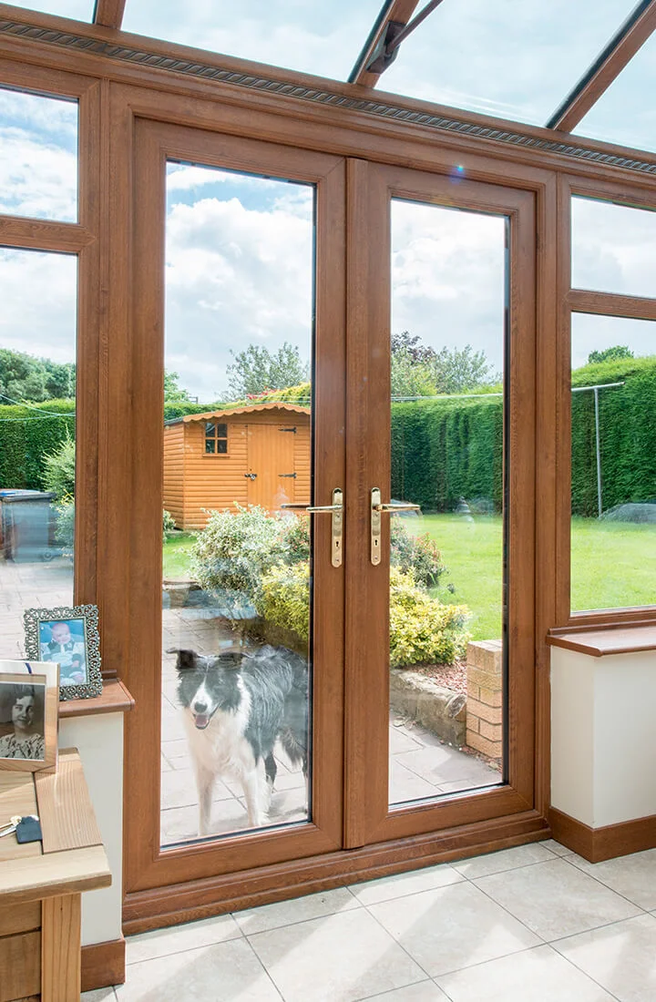 Interior view of oak effect French door showing natural light