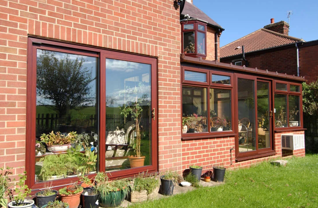 Rosewood and woodgrain uPVC patio doors showing colour options