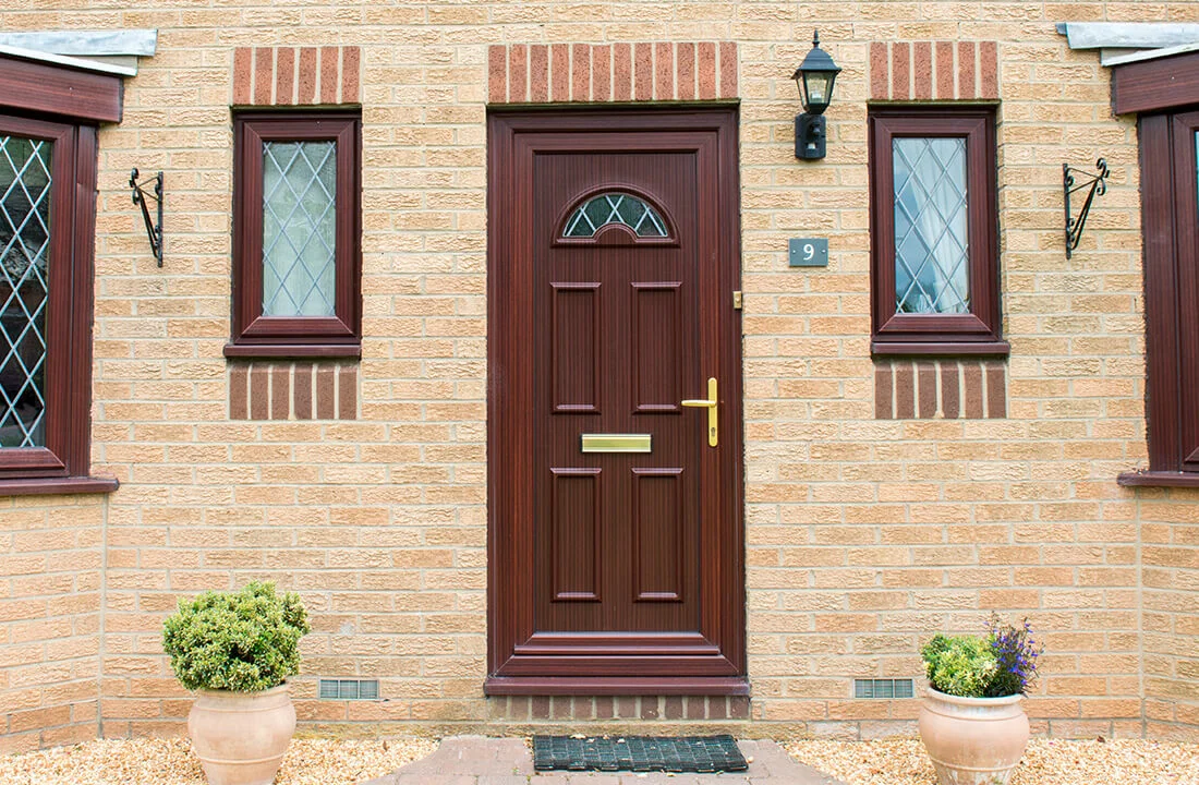 Rosewood woodgrain uPVC entrance door