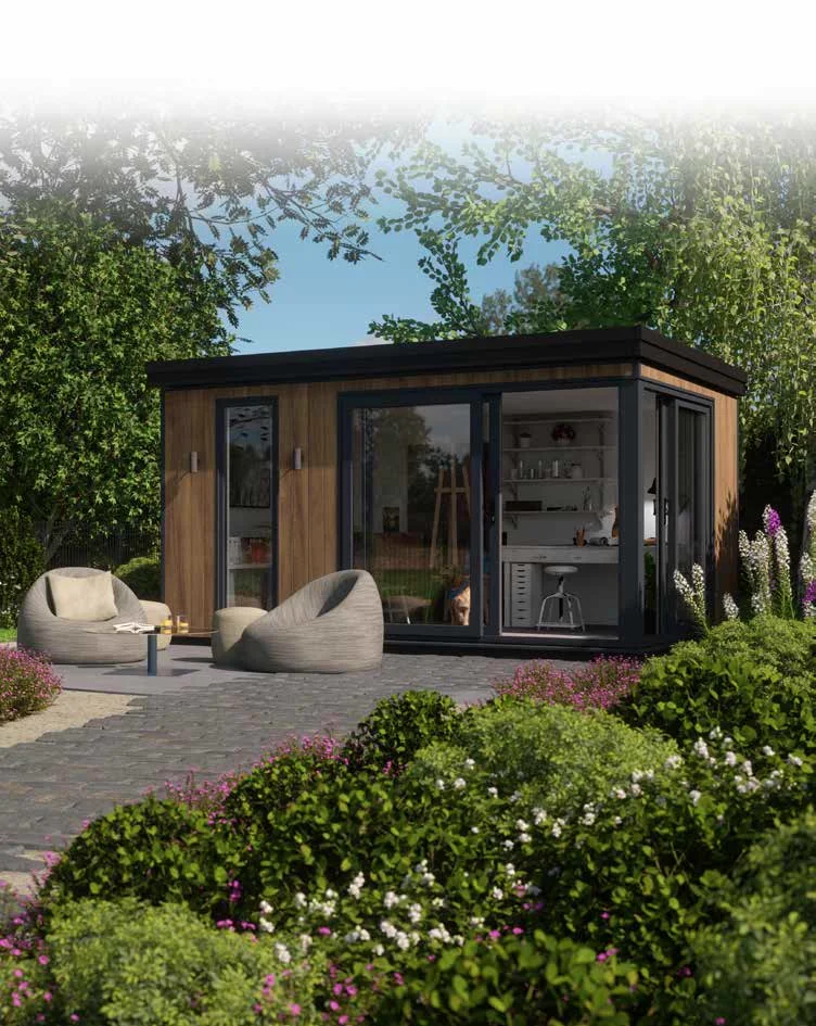 Garden room studio in a lush garden setting