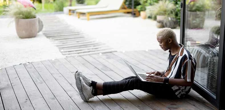 Person working outside a garden room