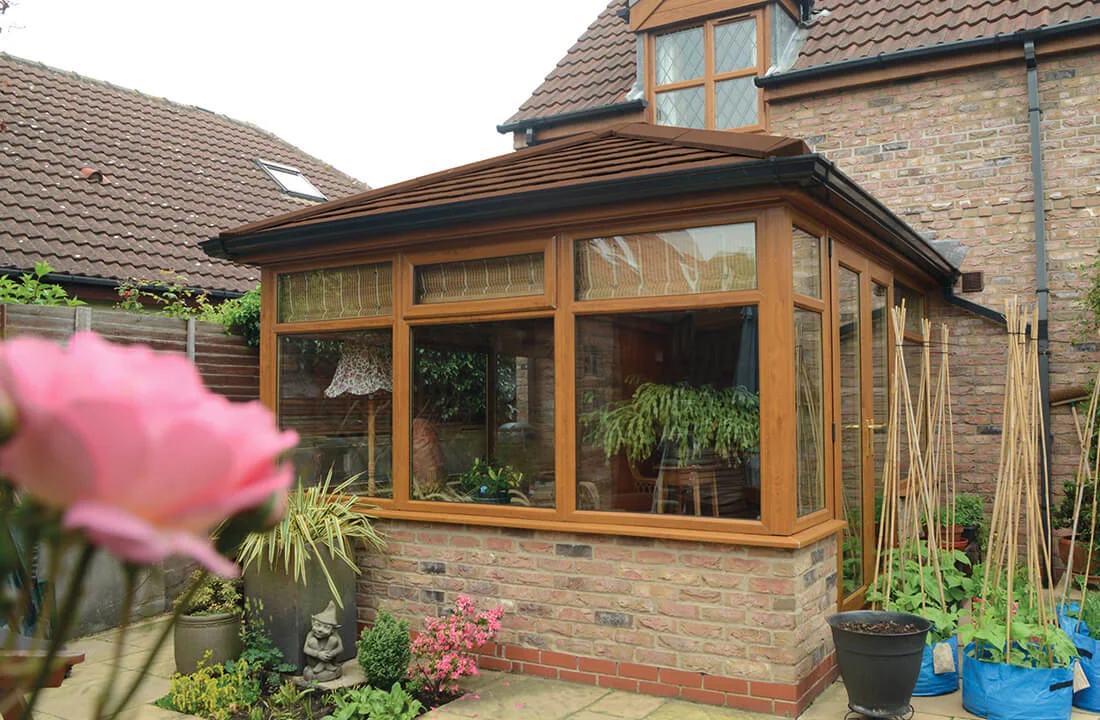 Oak conservatory with tiled roof