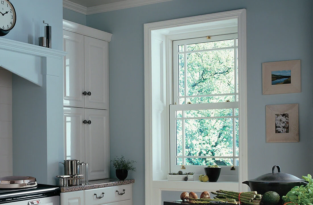 uPVC sash window showing decorative sash horns and traditional proportions
